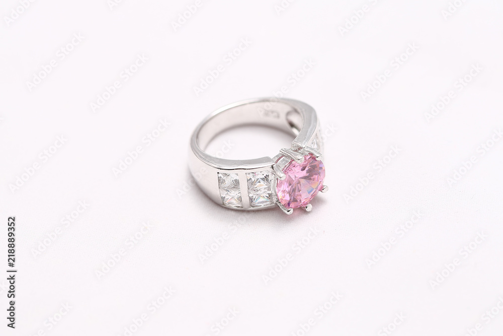 pink gem stone on diamond ring