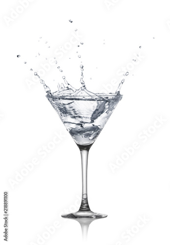 glass of alcohol drink with splash isolated on white background