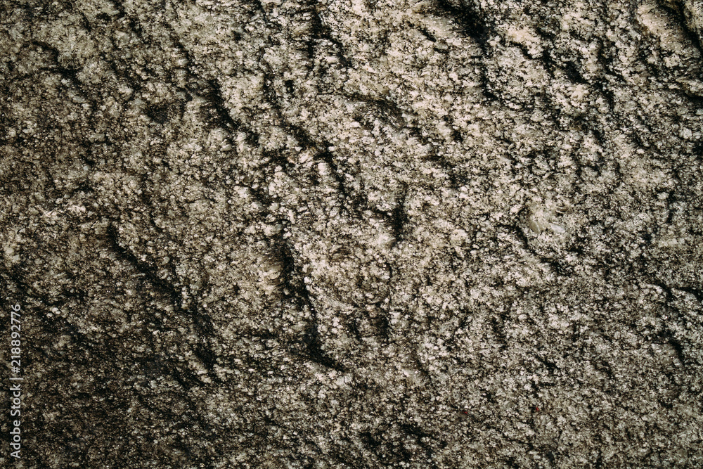 Marble untreated wall with irregularities and cracks Marble untreated wall with irregularities and cracks