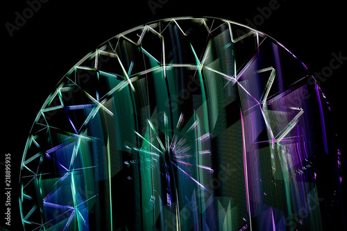 Colorful light waves and circles on black background