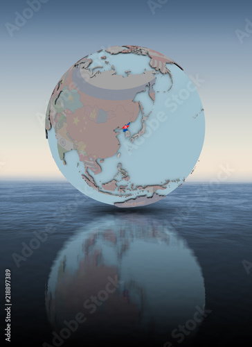 Fototapeta Naklejka Na Ścianę i Meble -  North Korea on globe above water surface