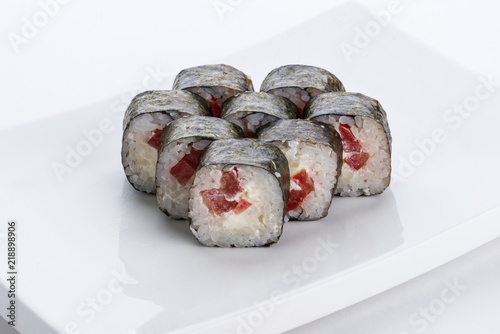 Sushi set and composition at white background. Japanese food restaurant, sushi maki gunkan roll plate or platter set.