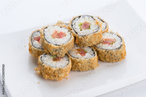 Sushi set and composition at white background. Japanese food restaurant  sushi maki gunkan roll plate or platter set.