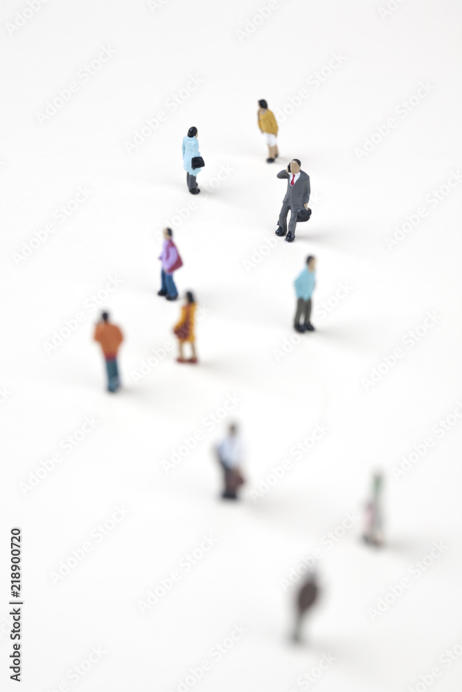 crowd of miniature people in the city