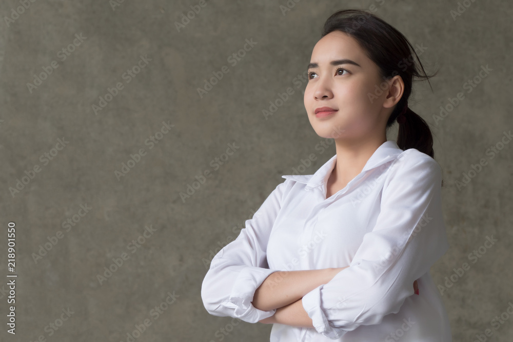 confident happy asian woman in white shirt; portrait of successful happy positive asian woman with confident face expression, proud of success; asian chinese 20s young adult woman model confident happy asian woman in white shirt; portrait of successful happy positive asian woman with confident face expression, proud of success; asian chinese 20s young adult woman model