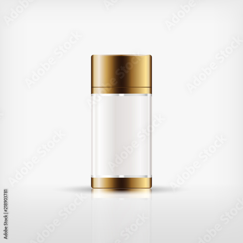 Isolated blank cosmetic bottle with gold cap on white background