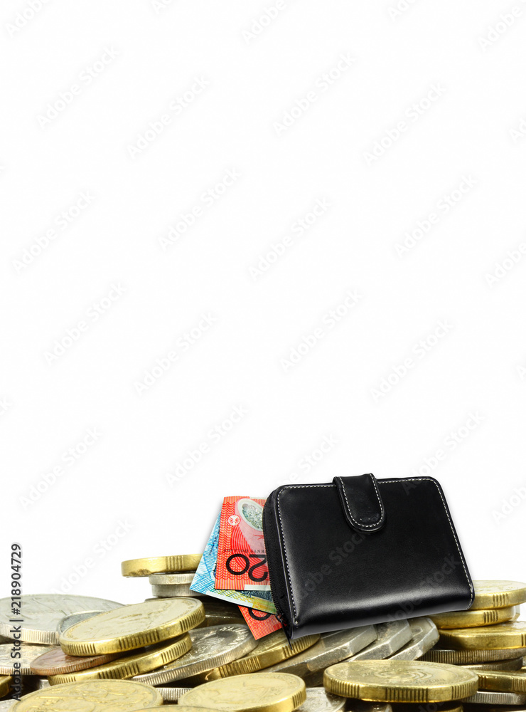 a pile of coins with Australian dollars and a black wallet a pile of coins with Australian dollars and a black wallet