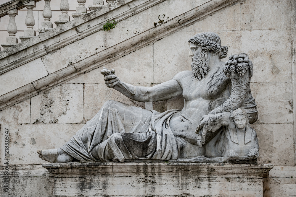 Obraz premium Statue of Neptune at Piazza del Campidoglio, Rome, Italy
