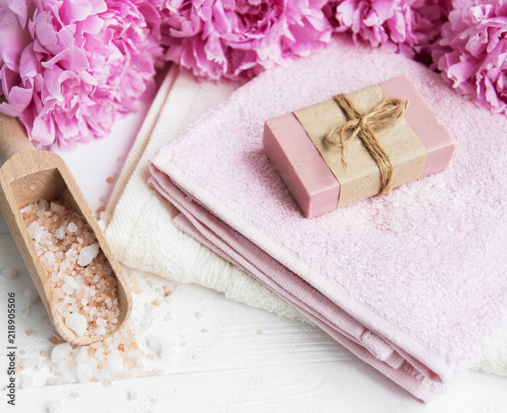 bars of handmade soap, soft towels and peony flowers bars of handmade soap, soft towels and peony flowers
