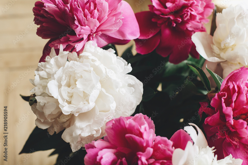 beautiful bunch of peonies in vase on wooden background, rustic wallpaper concept, space for text beautiful bunch of peonies in vase on wooden background, rustic wallpaper concept, space for text