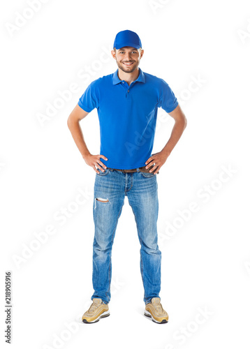 Full length portrait of confident handsome man in blue uniform photo