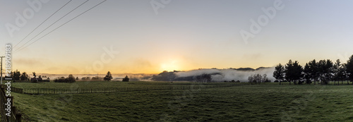 Sunrise over a rural landscape in a countryside of New Zealand