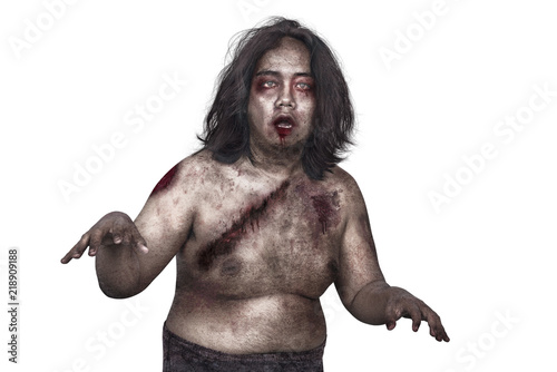 Portrait of zombie man with dirty body posing