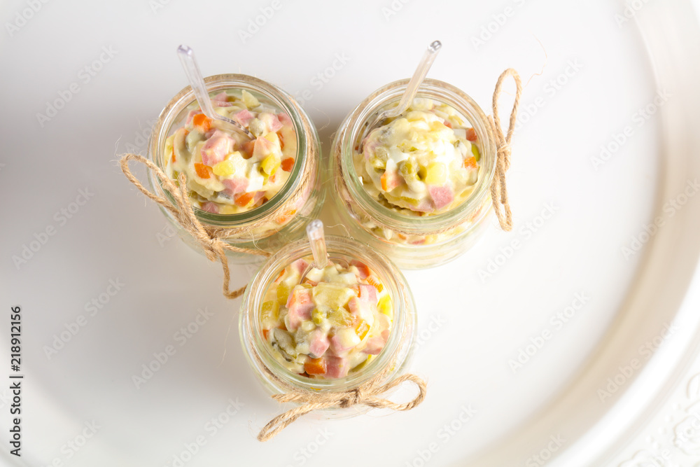 Russian salad in the glass can Russian salad in the glass can