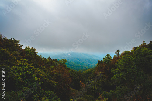 high mountains peaks range clouds in fog scenery landscape national park view outdoor  at Chiang Rai  Chiang Mai Province  Thailand