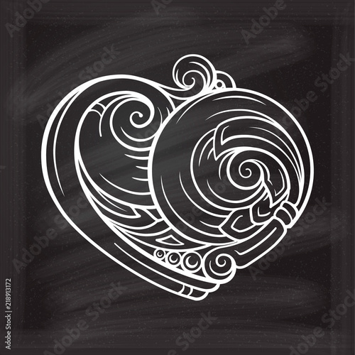 Ornamental stylized heart doodle on a chalkboard background photo