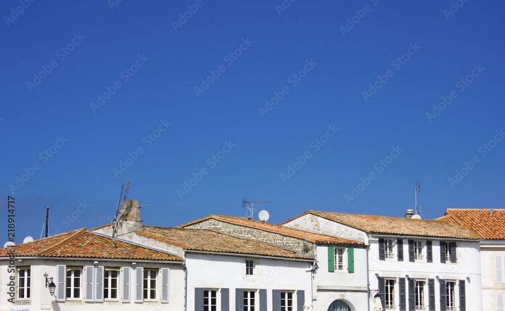 Roofs and blue sky in Saint-Martin-de-Ré at Ile de Ré