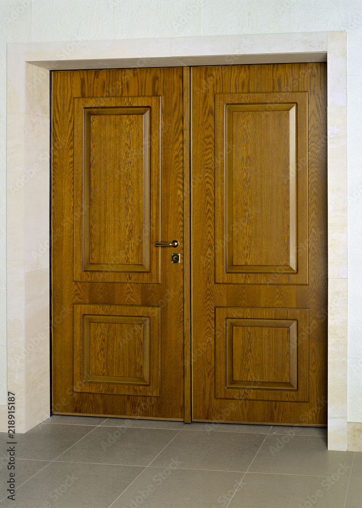 Image of closed wooden security door