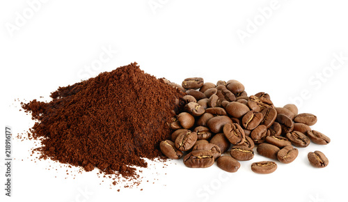 Pile of Ground coffee and coffee beans on white background