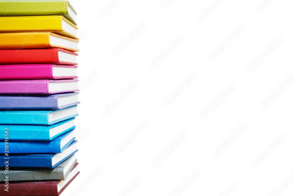 Books. A lot of books with bright covers in one pile isolated on white background. Place for text. Design element, paper and leather texture. Colorful books on the shelf, close up Books. A lot of books with bright covers in one pile isolated on white background. Place for text. Design element, paper and leather texture. Colorful books on the shelf, close up