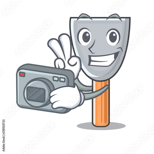Photographer cartoon putty knife in plaster