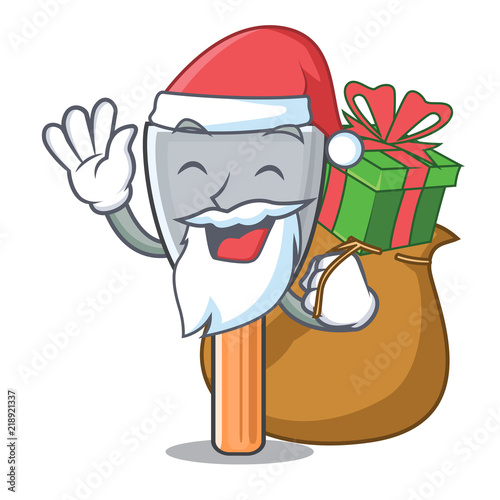 Santa with gift vintage putty knife on mascot