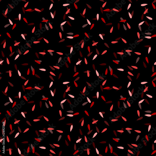 Elegant black seamless pattern with chaotic sparks in different shades of red and pink