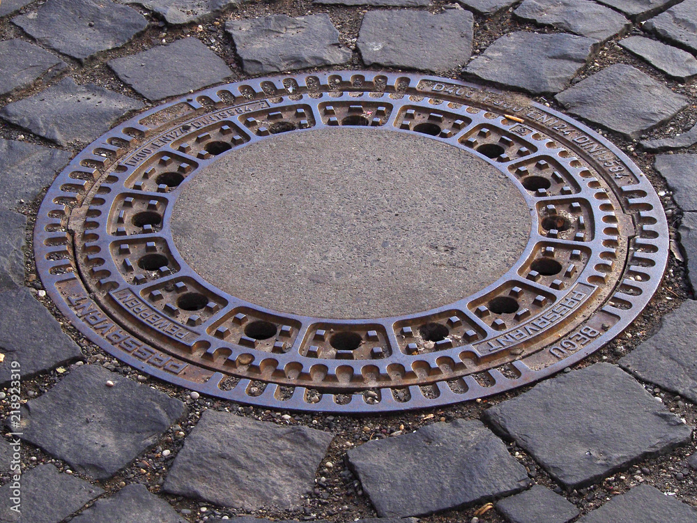 Decorative cover of the sewage well.