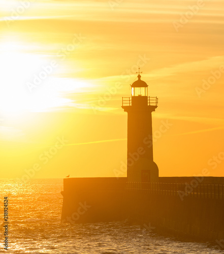 Lighthouse at sunset. Porto, Portugal