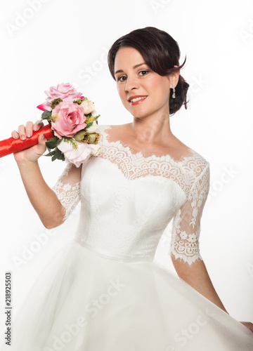 elegant bride with beautiful wedding bouquet in a hands. wedding make-up and hairstyle concept