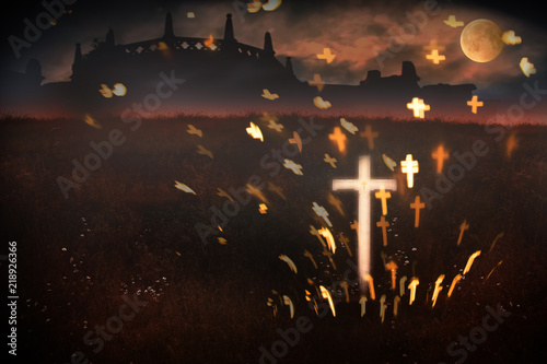 Halloween scene in twilight with crucifix