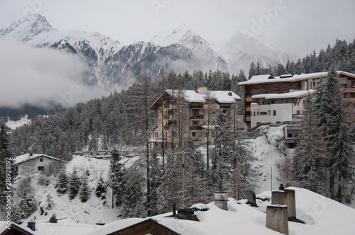 A view of chalets and mountains after heavy snow from the centre of a ski resort in the Tirol, Austria