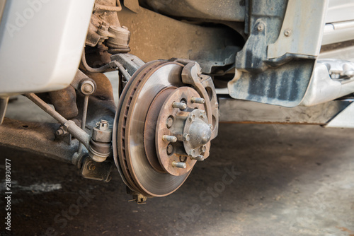 Repairing disc brake of the mini-truck in the garage