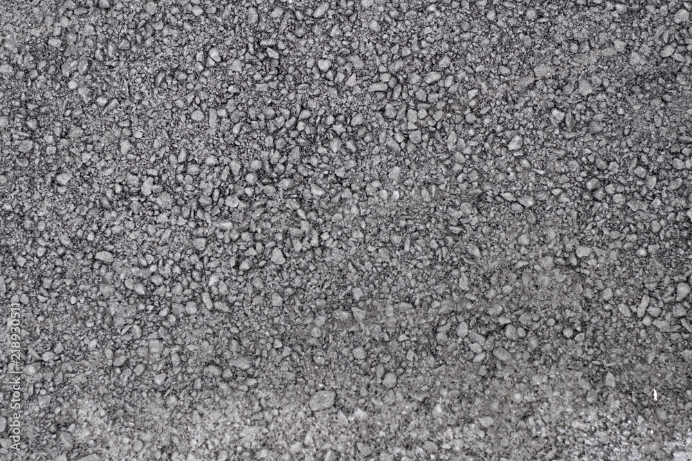 Smooth asphalt road. The texture of the tarmac, top view.