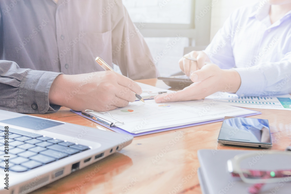 Administrator business man financial inspector and secretary making report, calculating or checking balance. Administrator business man financial inspector and secretary making report, calculating or checking balance.