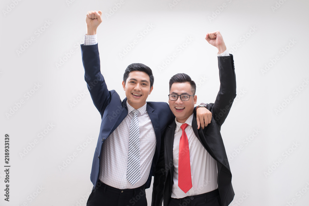 Successful Asian business man hands up feeling happy or win with background, Start up, Smart working, Success people, Partner and Teamwork concept Successful Asian business man hands up feeling happy or win with background, Start up, Smart working, Success people, Partner and Teamwork concept