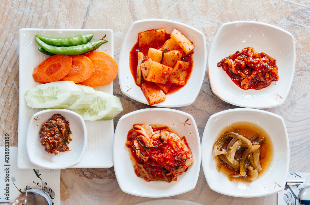 Cabbage, daikon Kimchi and small portion korean food side dishes Cabbage, daikon Kimchi and small portion korean food side dishes