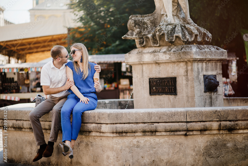 Beautiful happy couple embracing in the city.  