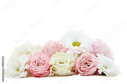 Bouquet of eustoma and chamomile flowers isolated on white background