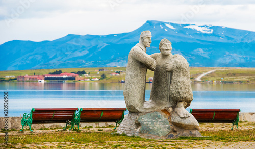 Stone sculpture in the background of the mountains, Puerto Natales, Chile. Copy space for text. photo