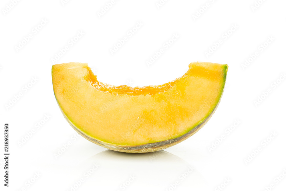 One slice of fresh melon cantaloupe variety without seeds isolated on white background