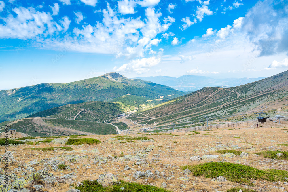 A view of some of the Guadarrama (Spain) mountains in summer, with a ski resort installations in the front