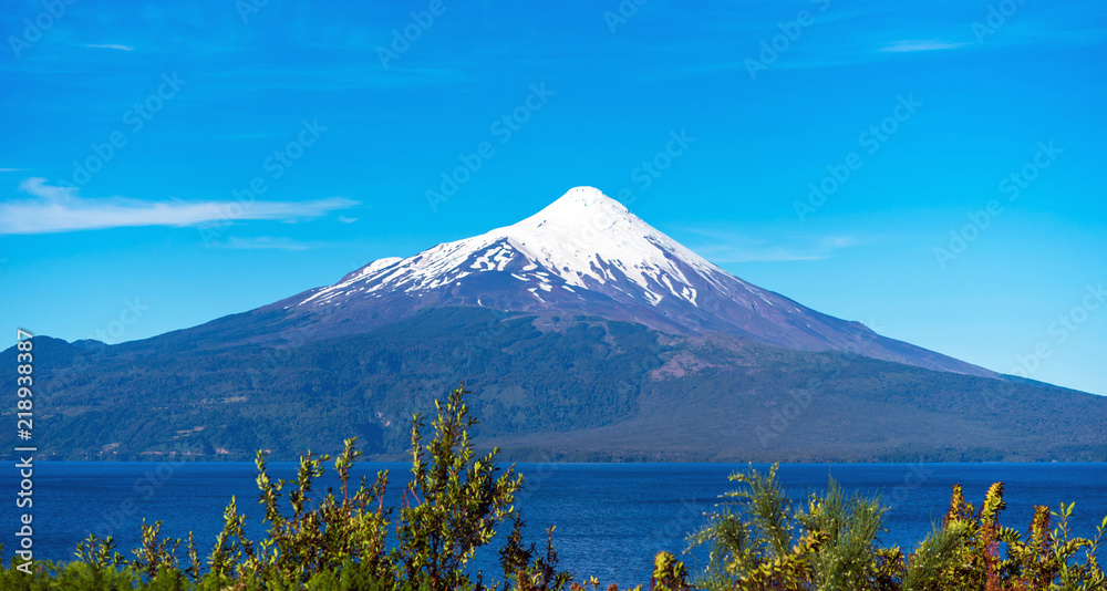 Obraz premium Volcano Osorno in national park Vicente Perez Rosales, Chile. Copy space for text.