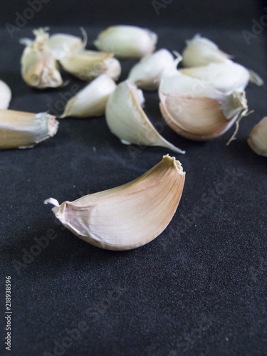 Garlic Cloves on Black Background