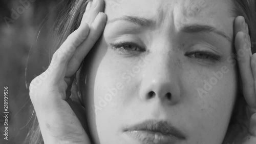 young girl has a headache