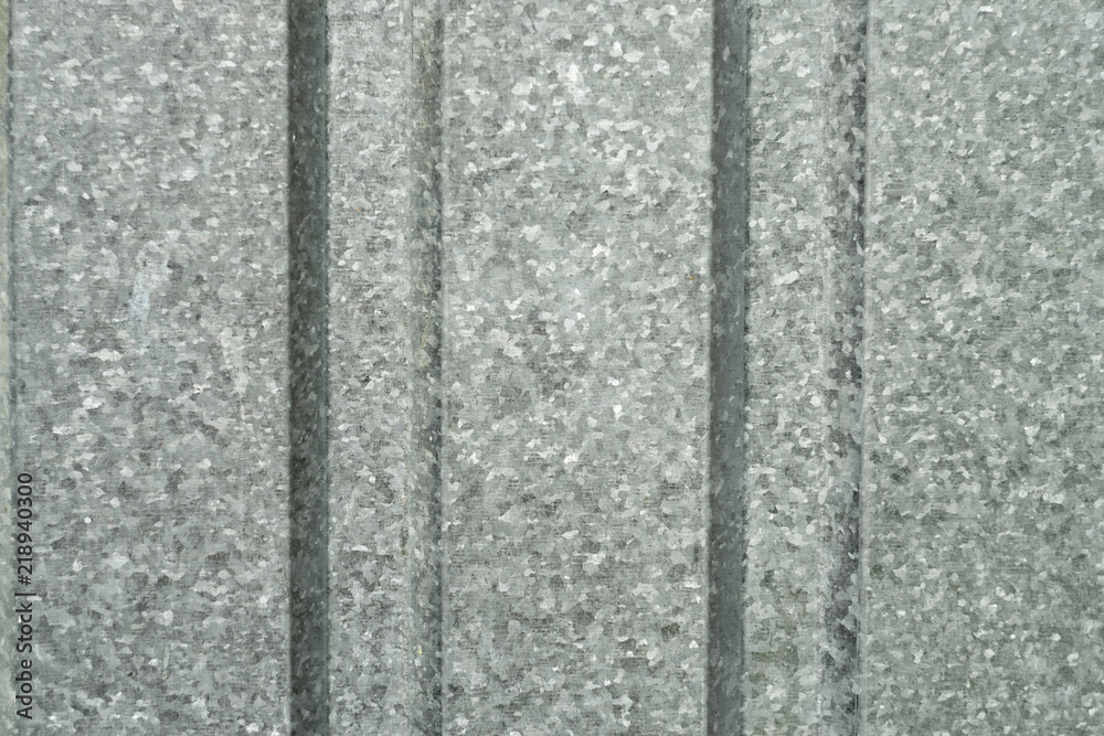 Metal fence is profiled with vertical stripes Metal fence is profiled with vertical stripes