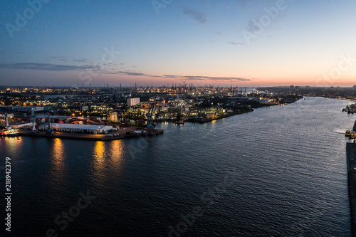 Aerial view of the harbor district, the concert hall "Elbphilharmonie" and downtown Hamburg, Germany, at dusk.  © nikwaller
