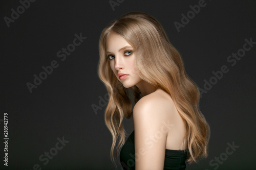 Beautiful Woman Face Portrait Beauty Skin Care Concept with long blonde hair 