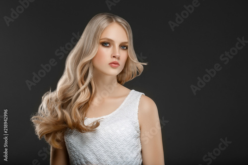 Beautiful Woman Face Portrait Beauty Skin Care Concept with long blonde hair 