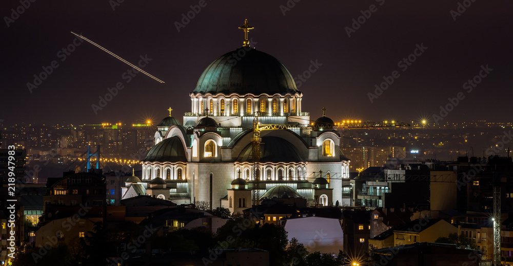Fototapeta premium Belgrade, Serbia - April 10, 2017: Belgrade panorama with the temple of St. Sava by night